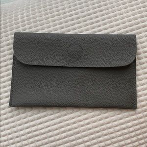 Simple grey clutch with magnetic closure